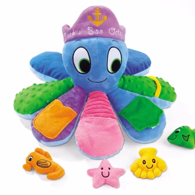 A colorful soft octopus toy with pockets and textures on the arms. It is wearing a hat with an anchor and the text: Peek a Boo Octopus. In front are four smaller soft sea creatures: an orange seahorse, a pink starfish, a yellow seashell, and a green clownfish.